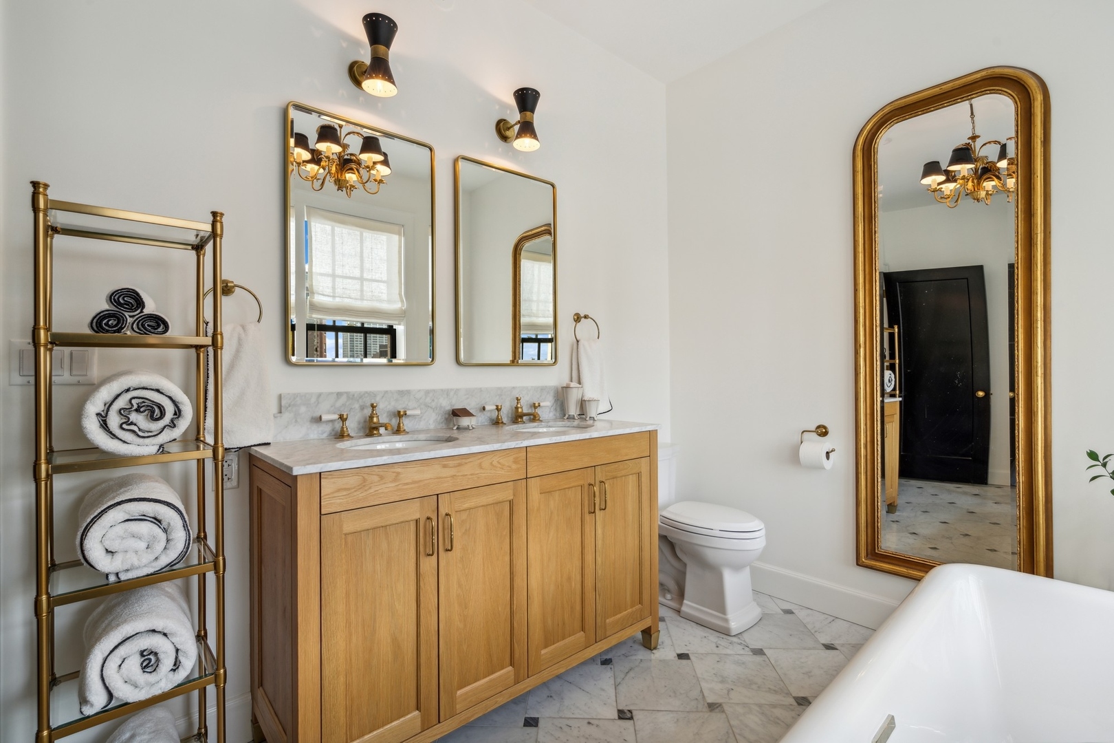 3100 North Sheridan Road, Unit 14B Chicago, IL 60657 - Photo 41 of 50 a bathroom with a toilet a sink and a mirror