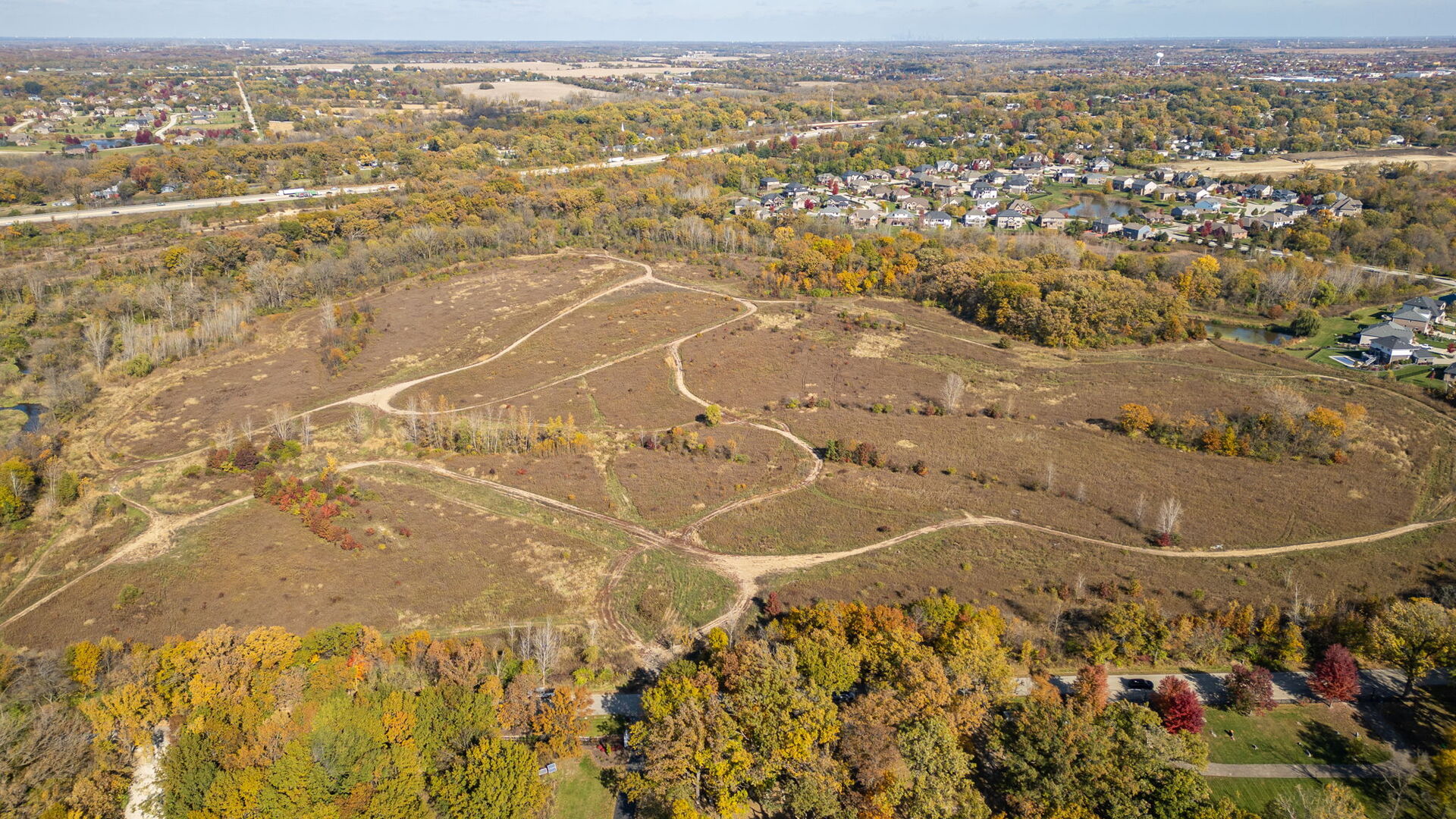 12858 West Regan Road Mokena, IL 60448 - Photo 13 of 13 an aerial view of residential houses with city space