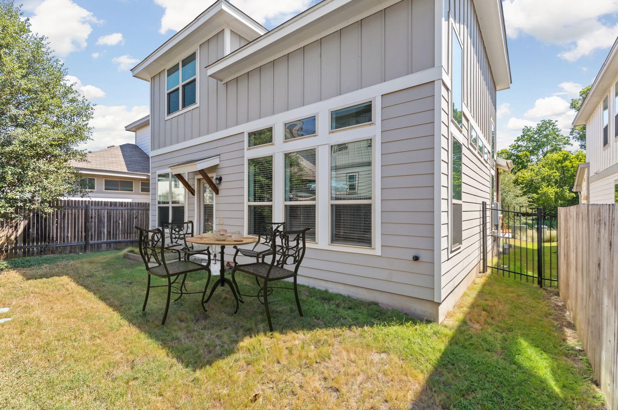 907 Totis Road Austin, TX 78748 - Photo 25 of 30 Backyard perfect for al fresco dining or relaxing with morning coffee!