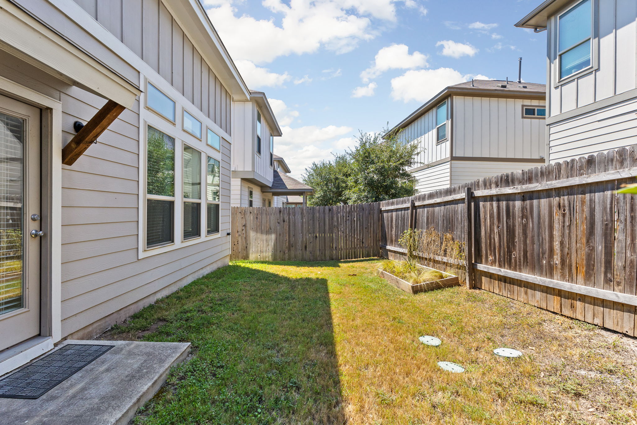 907 Totis Road Austin, TX 78748 - Photo 27 of 30 The backyard is maintained by the HOA