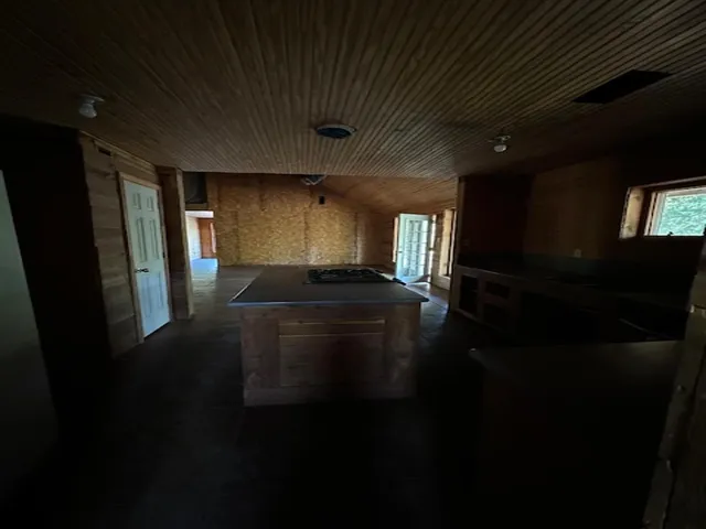 a view of entryway with kitchen