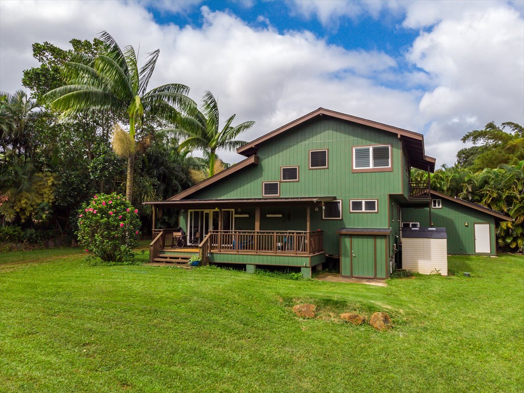 5698 Olohena Road, Unit 17 Kapaa, HI 96746 - Photo 1 of 23 a front view of house with yard outdoor seating and barbeque oven