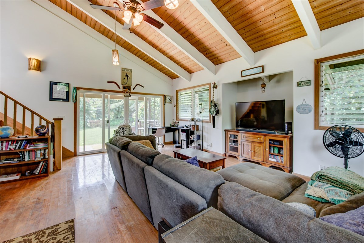 5698 Olohena Road, Unit 17 Kapaa, HI 96746 - Photo 3 of 23 a living room with furniture and a flat screen tv