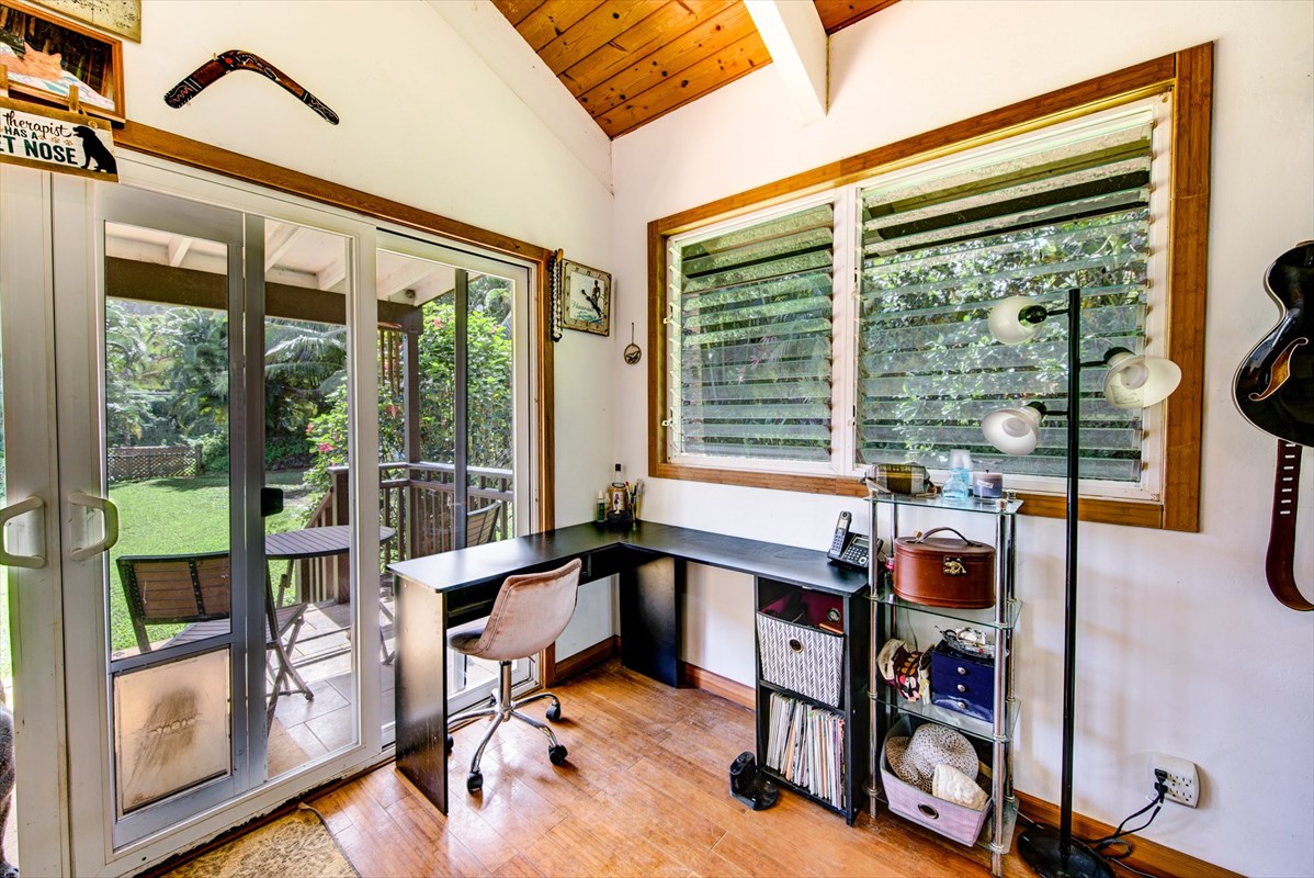 5698 Olohena Road, Unit 17 Kapaa, HI 96746 - Photo 10 of 23 a view of a workspace with furniture and a window