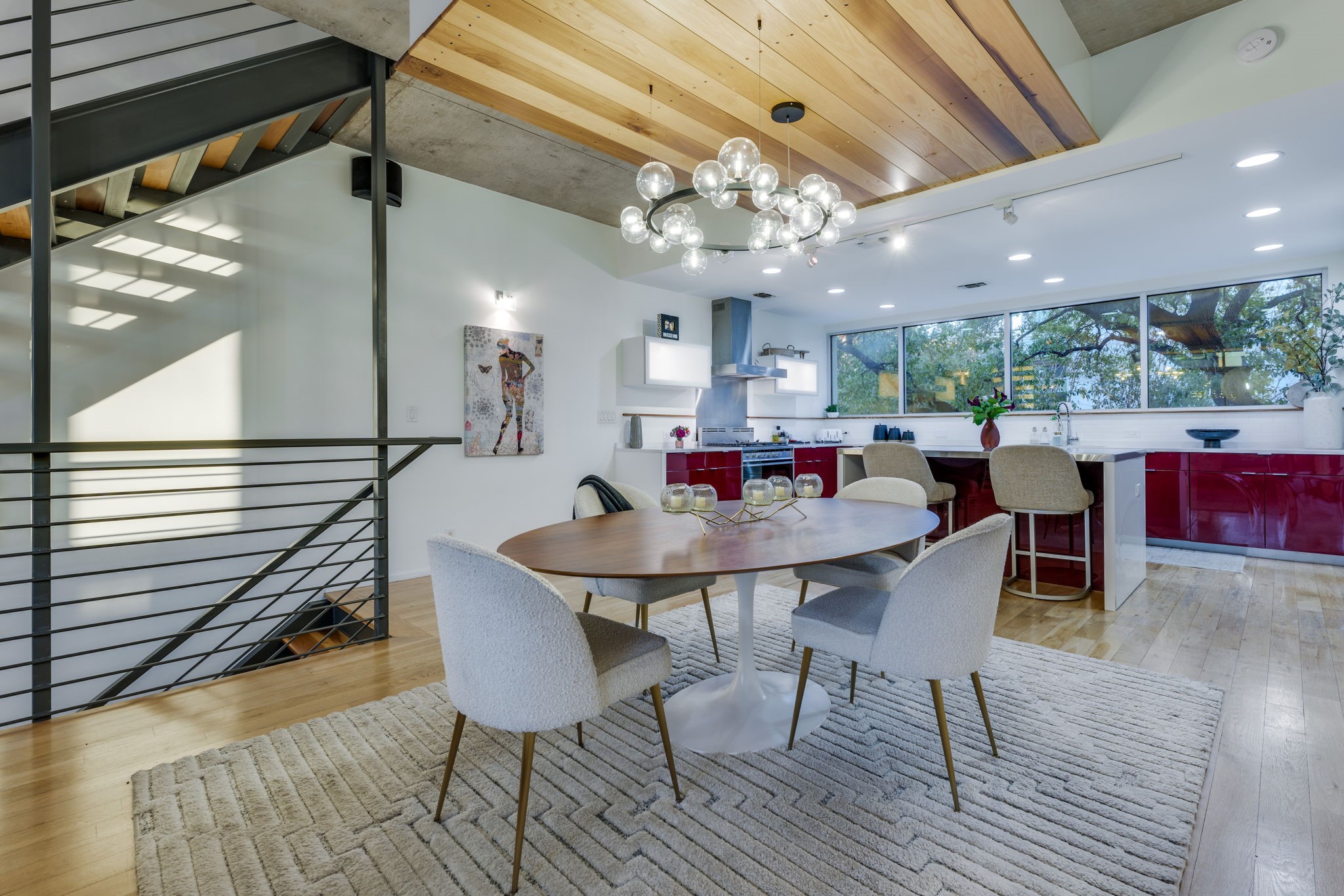 2301 South 5th Street, Unit 5 Austin, TX 78704 - Photo 12 of 39 Dining space featuring a notable chandelier and light hardwood / wood-style floors