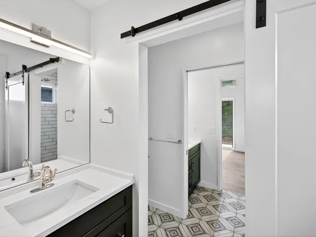 a view of a room next to a window