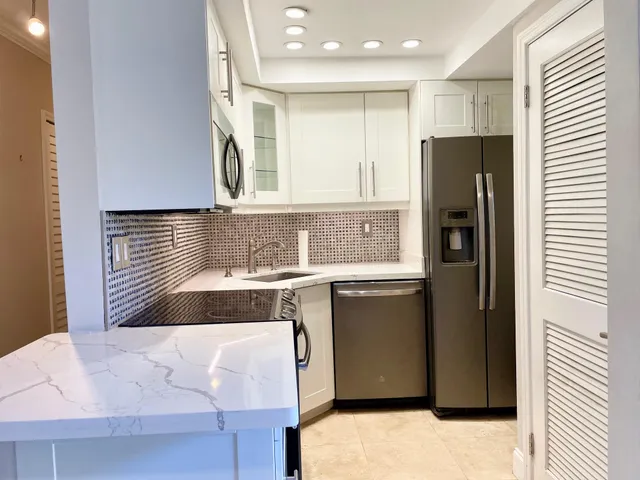 a bathroom with a bathtub and a sink