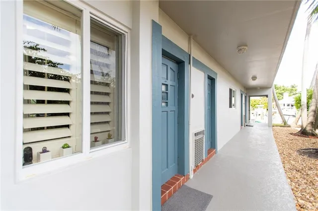 a view of a living room with windows