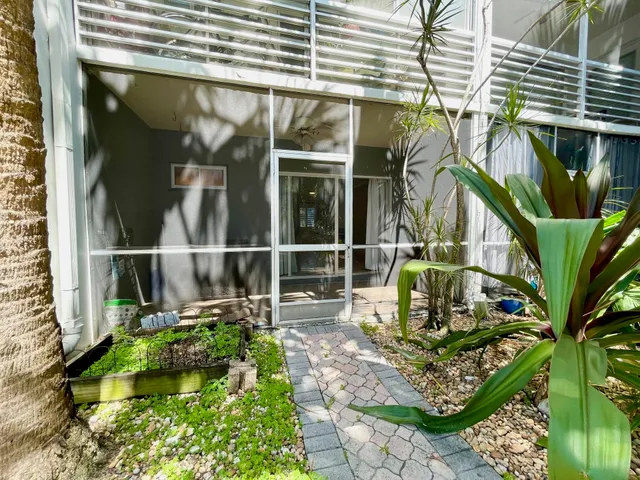 a view of a swimming pool with a sitting space