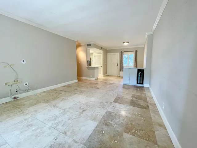 a view of a livingroom with a staircase