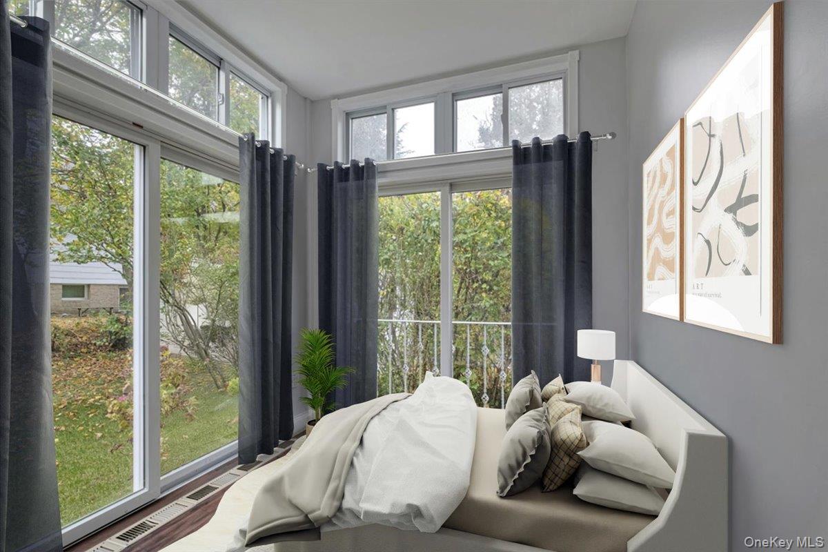 193 Nelson Road Scarsdale, NY 10583 - Photo 13 of 37 a bedroom with furniture and a large window