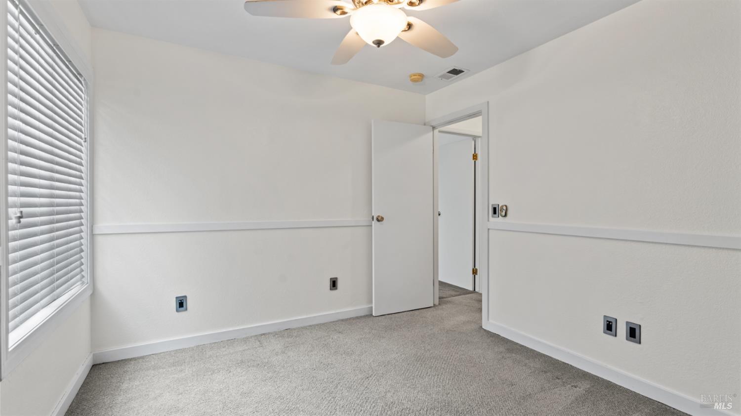 6454 Amberwood Street Rohnert Park, CA 94928 - Photo 12 of 18 This is the balance of the bedroom showing exit to hallway, also showing entry door to third bedroom.