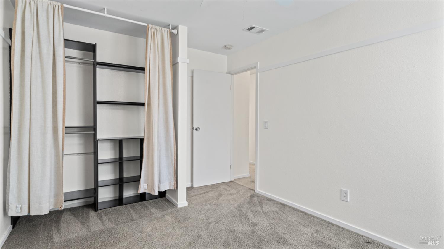 6454 Amberwood Street Rohnert Park, CA 94928 - Photo 13 of 18 Bedroom #3 at end of hall, has a creative closet solution.