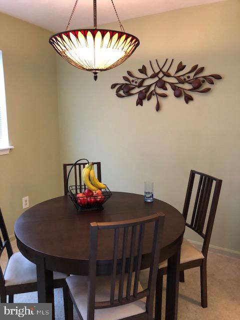 8341 Montgomery Run Road, Unit J Ellicott City, MD 21043 - Photo 11 of 39 Dining room