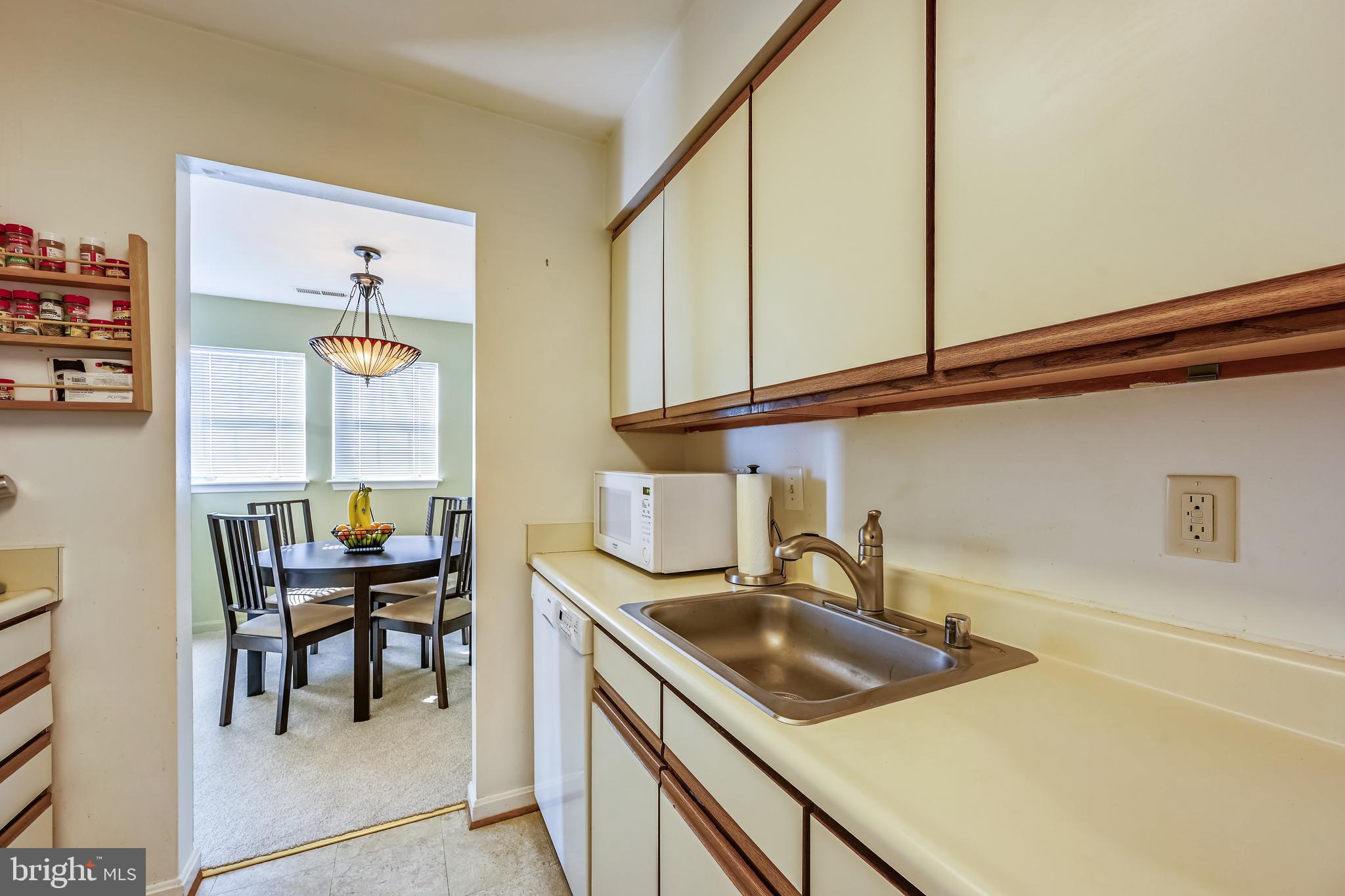 8341 Montgomery Run Road, Unit J Ellicott City, MD 21043 - Photo 19 of 39 Kitchen/ Dining room