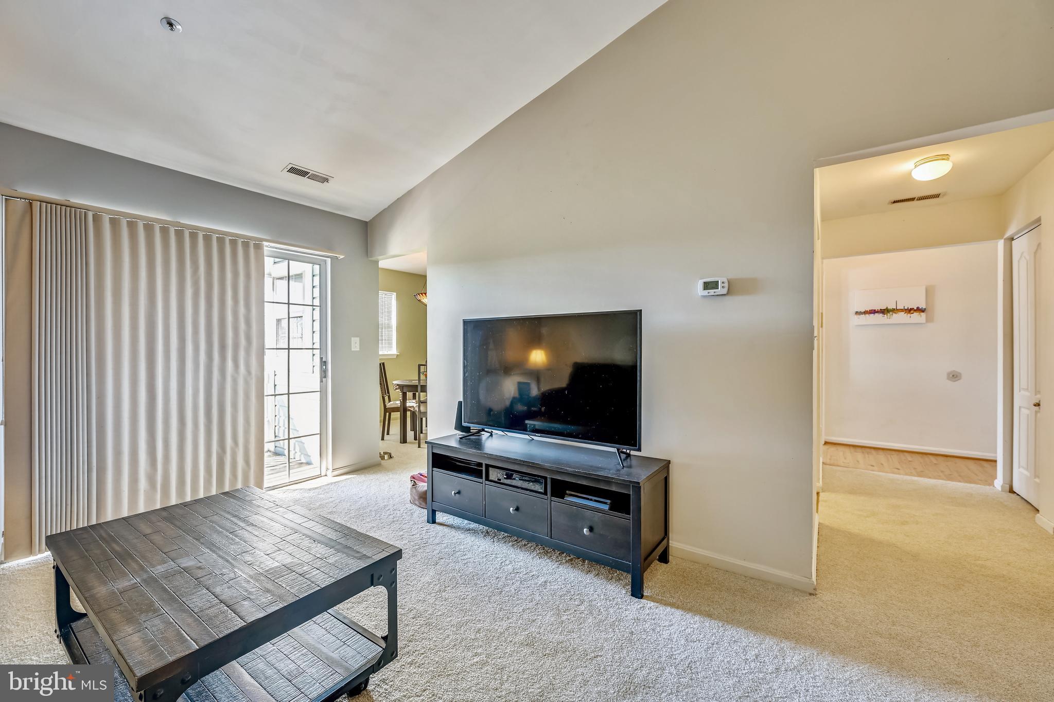 8341 Montgomery Run Road, Unit J Ellicott City, MD 21043 - Photo 22 of 39 Living Room