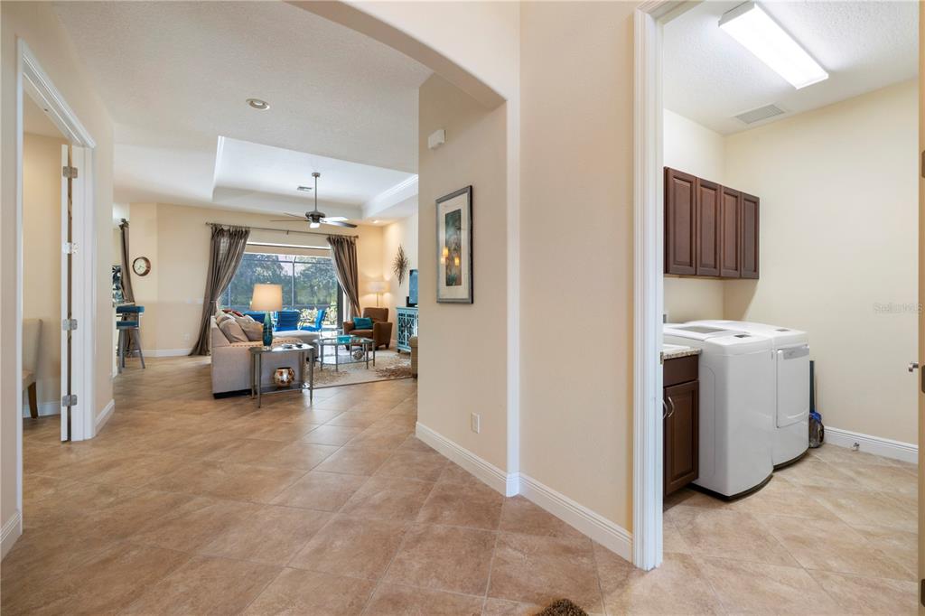 7608 Rio Bella Place Bradenton, FL 34201 - Photo 2 of 26 a view of a room with gym equipment and furniture