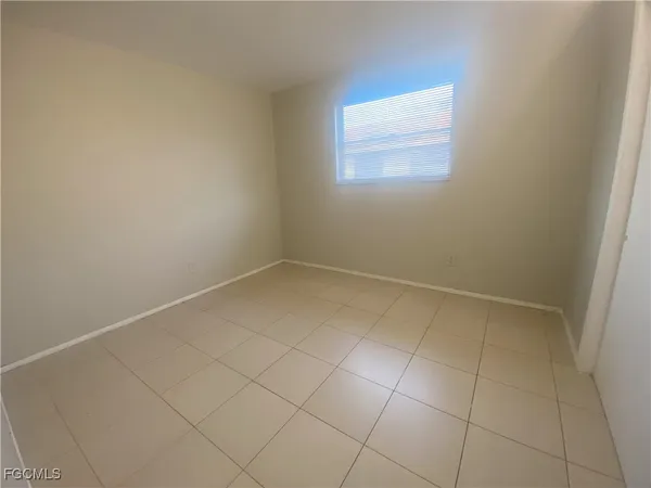 an empty room with a window