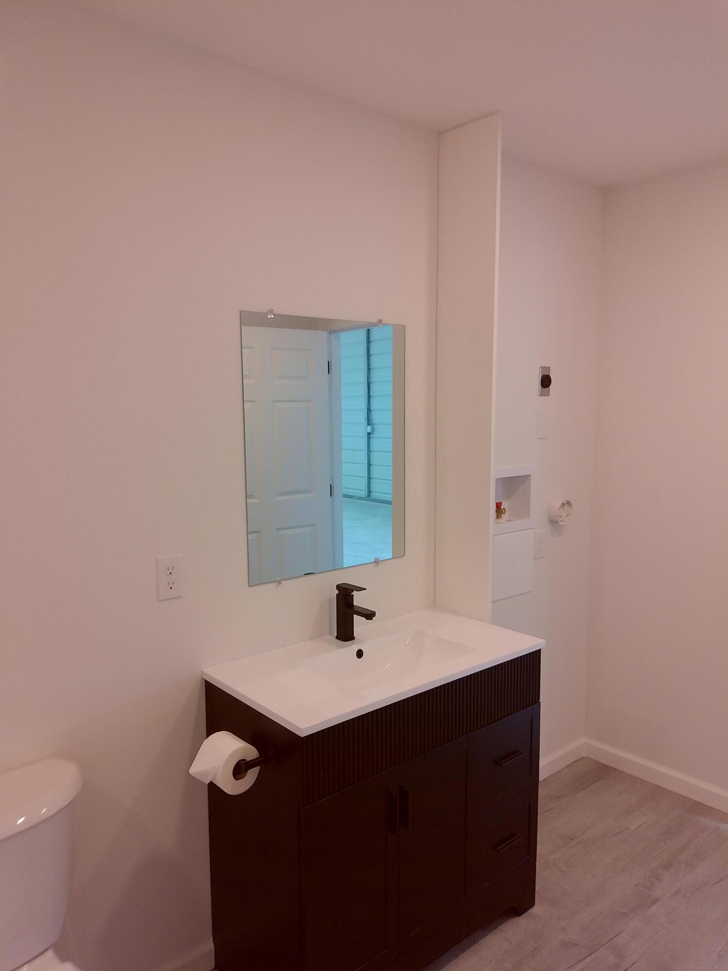 5668 Tennessee 58 Decatur, TN 37322 - Photo 15 of 24 a bathroom with a sink and a mirror