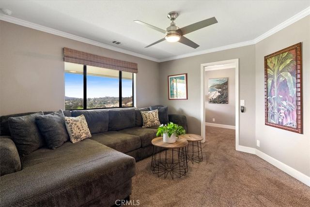 a workspace with furniture and a window