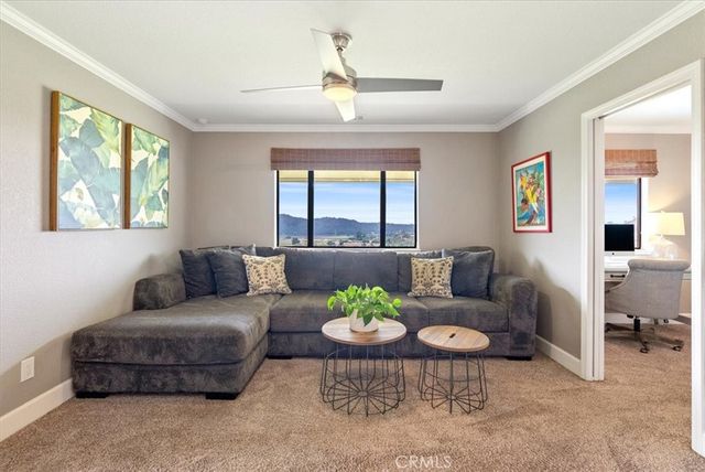 a work room with furniture and a window