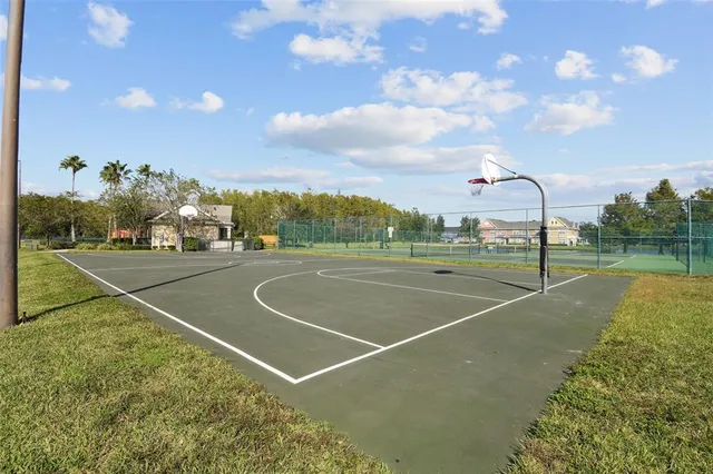 an aerial view of a house with a lake view