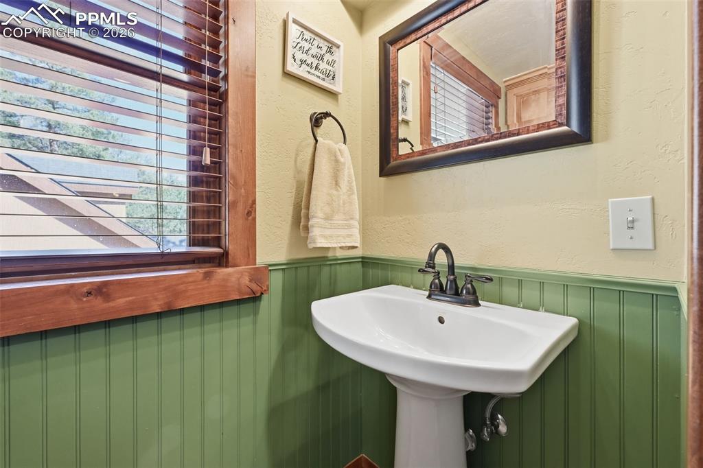 89 Ranch View Road Florissant, CO 80816 - Photo 22 of 50 Main level 1/2 bathroom