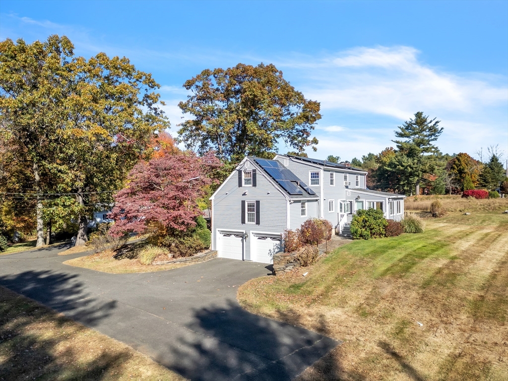 50 Old Wilson Road Northampton, MA 01062 - Photo 4 of 42 a front view of a house with a yard