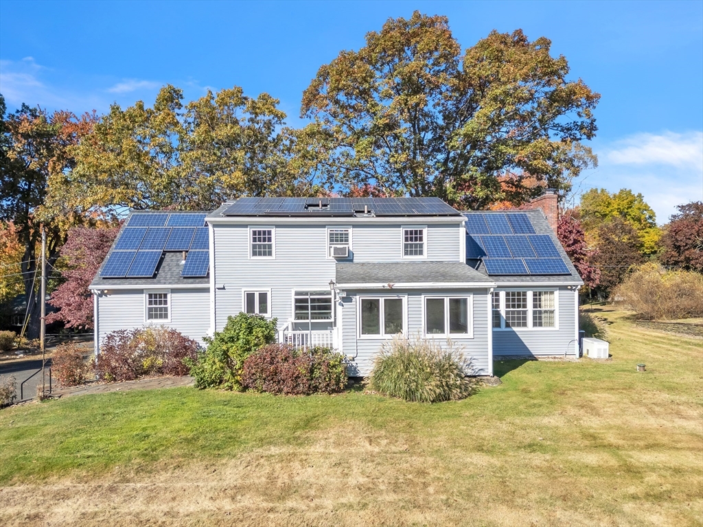 50 Old Wilson Road Northampton, MA 01062 - Photo 6 of 42 a front view of a house with a garden