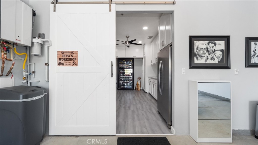 4699 Reflection Lane Ontario, CA 91762 - Photo 25 of 32 a view of a hallway to a bedroom and with furniture