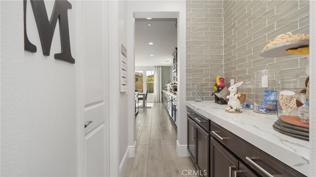4699 Reflection Lane Ontario, CA 91762 - Photo 7 of 32 a bathroom with a sink and a mirror