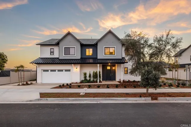 a view of a house with a clock on the wall