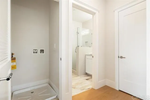 a bathroom with a tub and shower