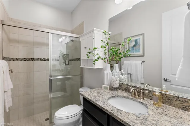 a view of cabinets with white cabinets