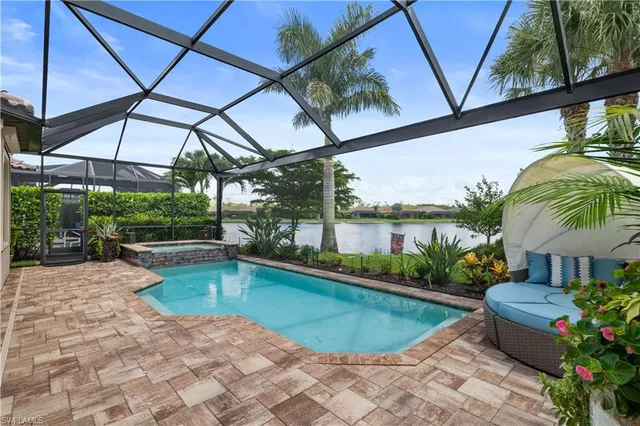 a view of a swimming pool with a patio