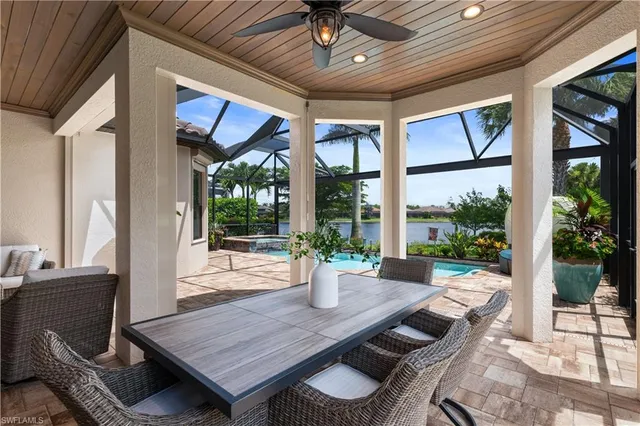 a kitchen with stainless steel appliances granite countertop a stove and a refrigerator