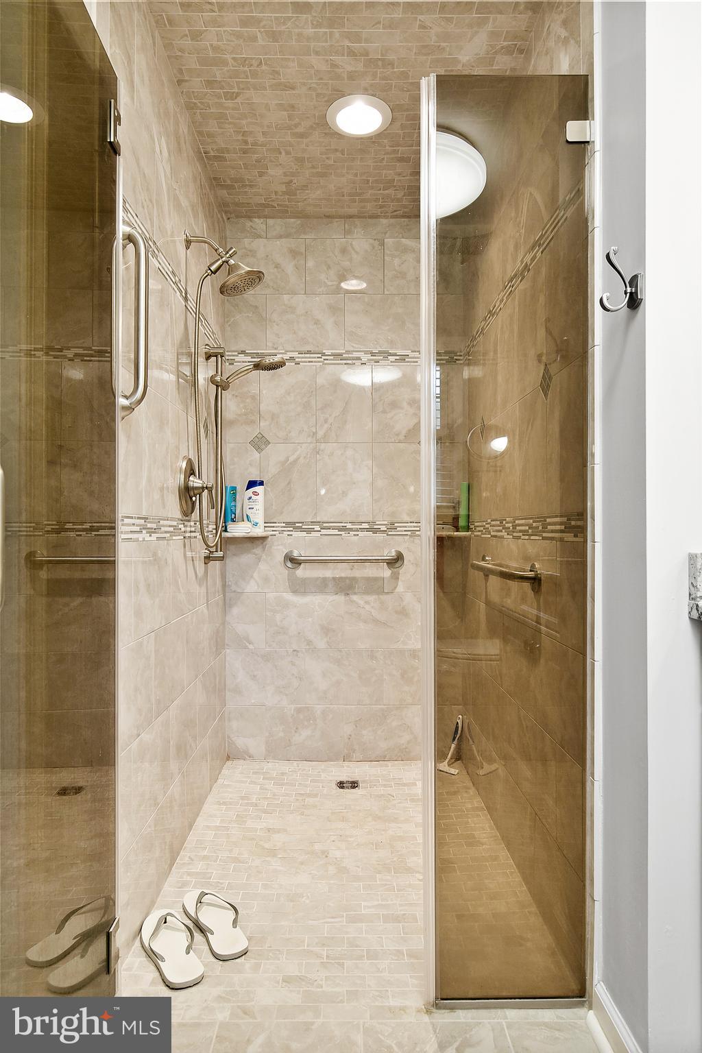 9 Dale Road Burlington, NJ 08016 - Photo 23 of 41 Primary bath shower w/custom tile, seamless door