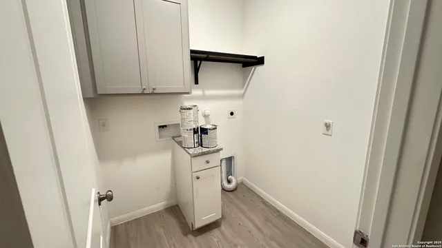 a bathroom with a sink a toilet and vanity