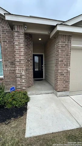 a view of front door and outdoor space