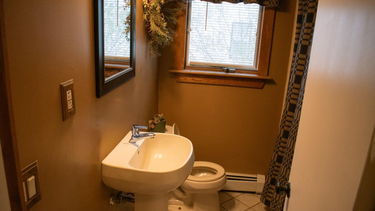 13 Colonial Street Waterville, ME 04901 - Photo 9 of 25 1st Floor Bathroom