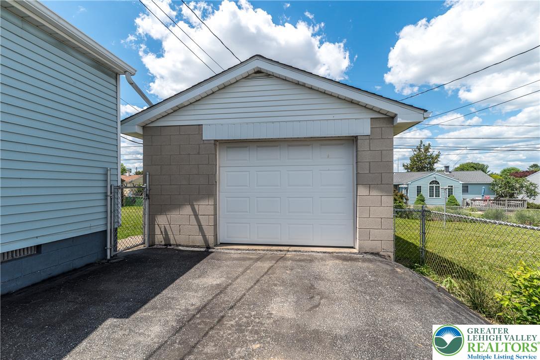 2132 Cypress Road Bethlehem, PA 18018 - Photo 11 of 16 One car garage features a durable block construction electric door opener and additional overhead storage.