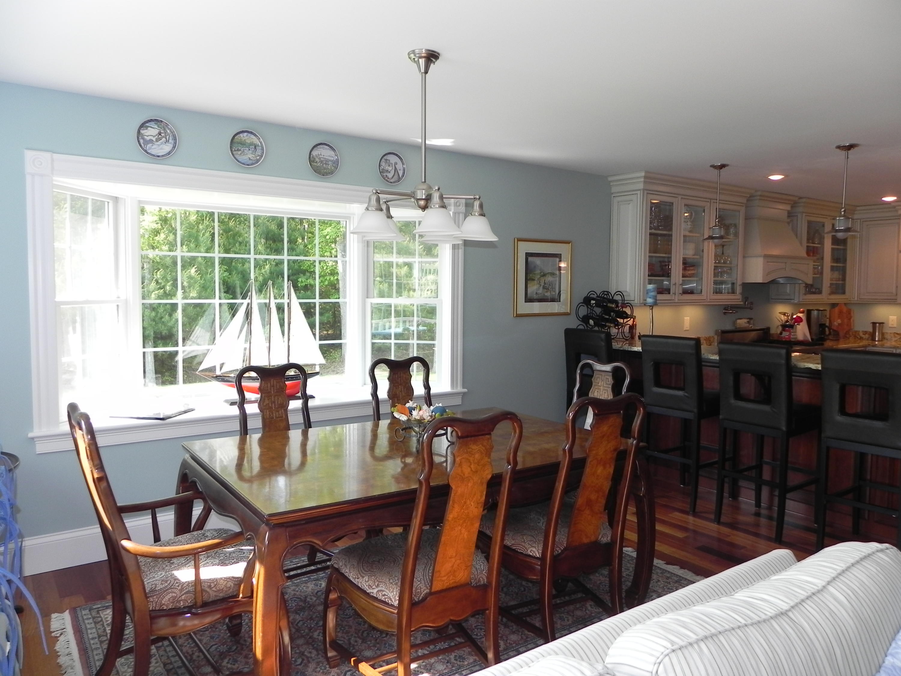 160 Bay Road Cotuit, MA 02635 - Photo 10 of 31 a view of a dining room with furniture window and outside view