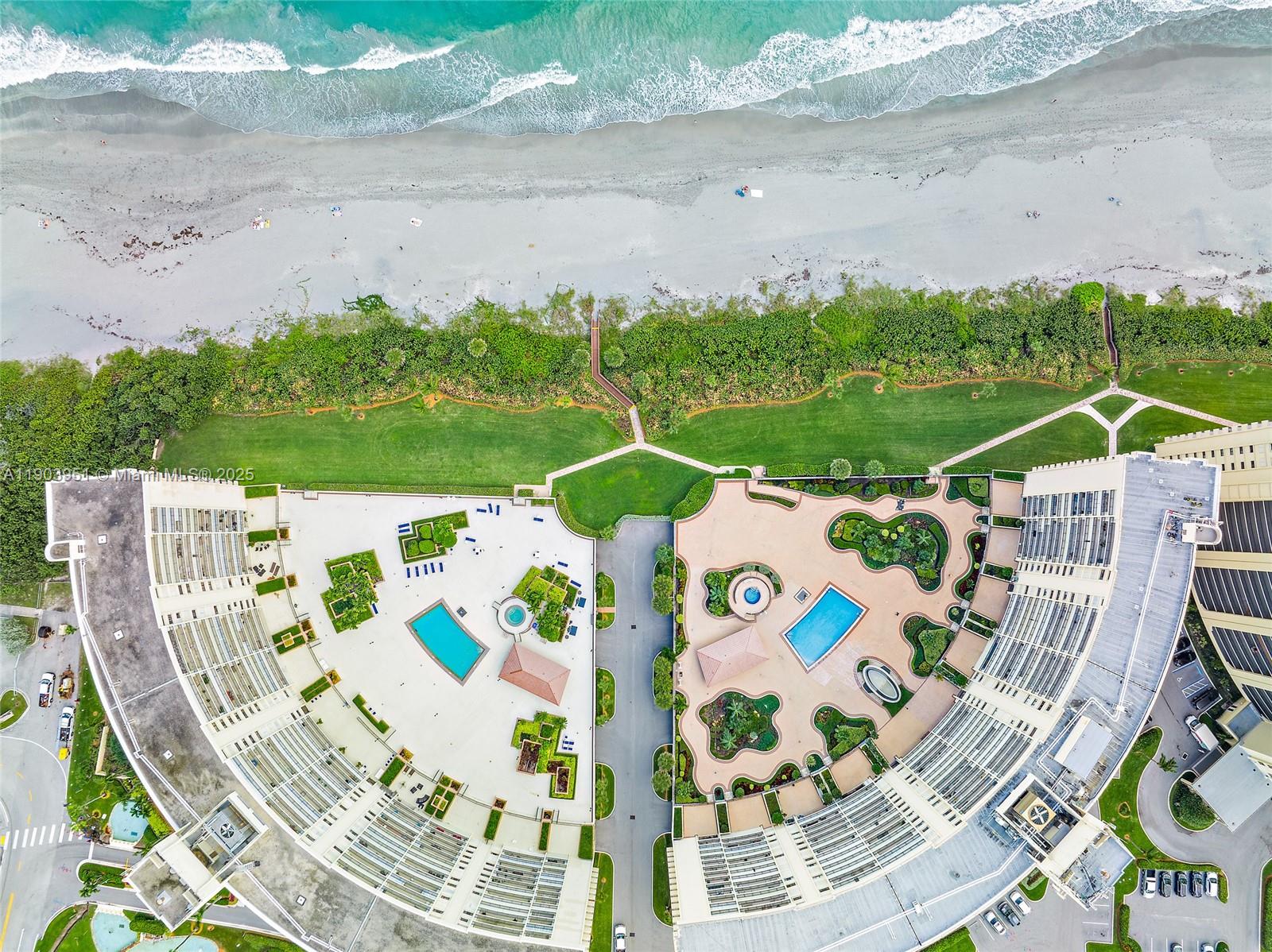 400 Ocean Trail Way, Unit 1005 Jupiter, FL 33477 - Photo 23 of 23 a view of an chairs and tables in the patio