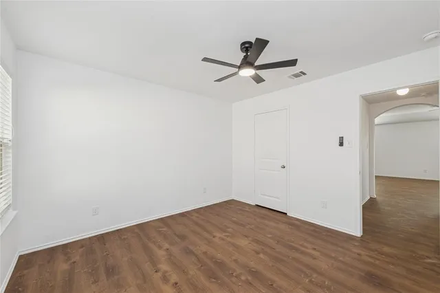 a view of a big room with wooden floor
