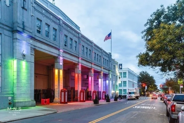a view of a building on a street