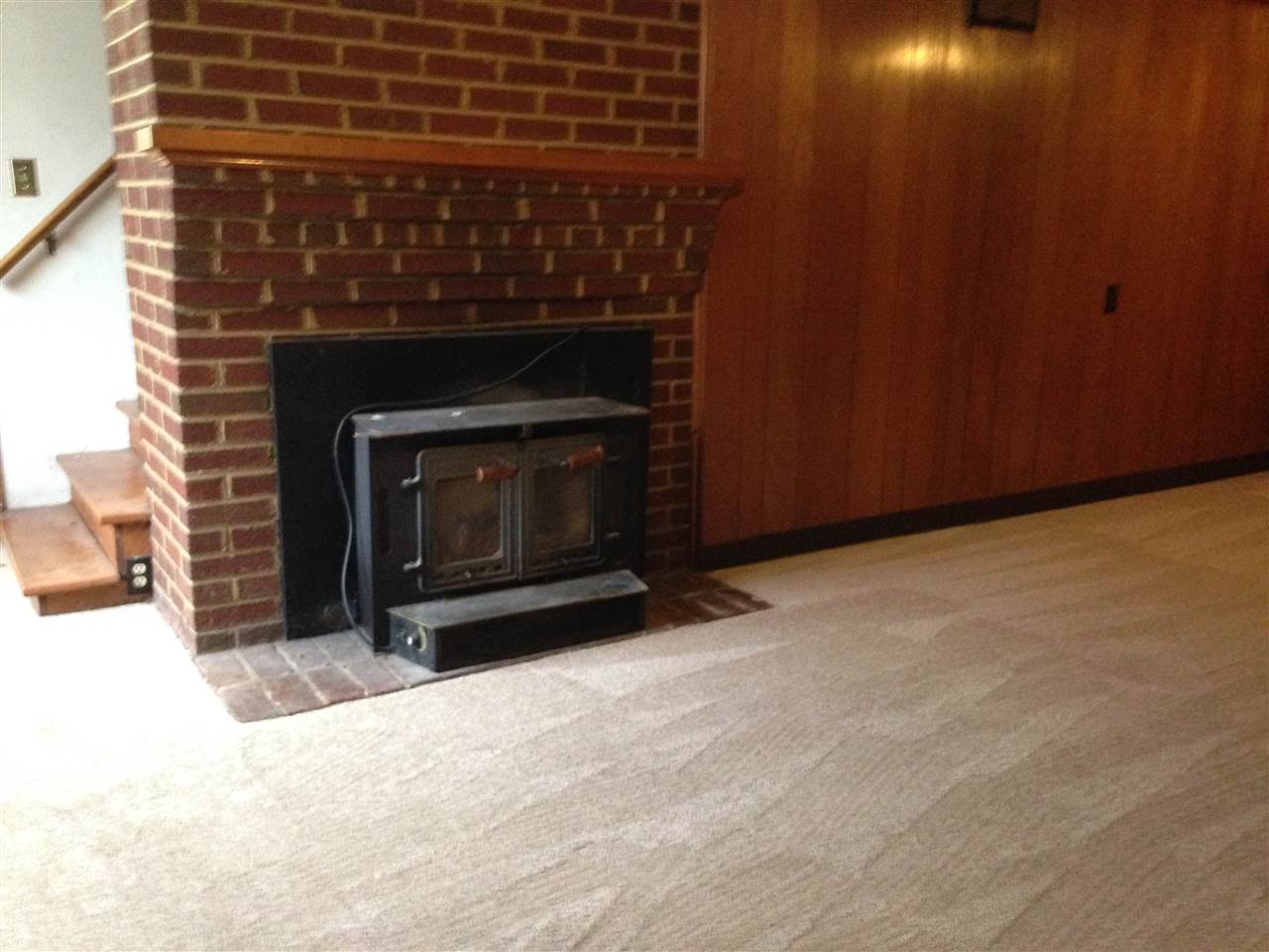 1418 Spring Hill Road Staunton, VA 24401 - Photo 15 of 18 a living room with a fireplace