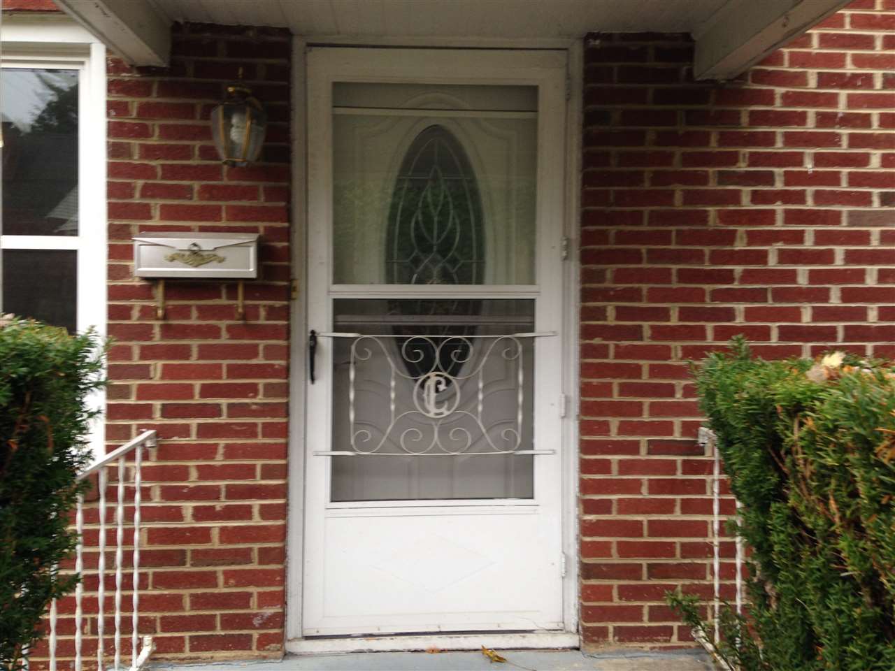 1418 Spring Hill Road Staunton, VA 24401 - Photo 2 of 18 a view of a door with brick walls