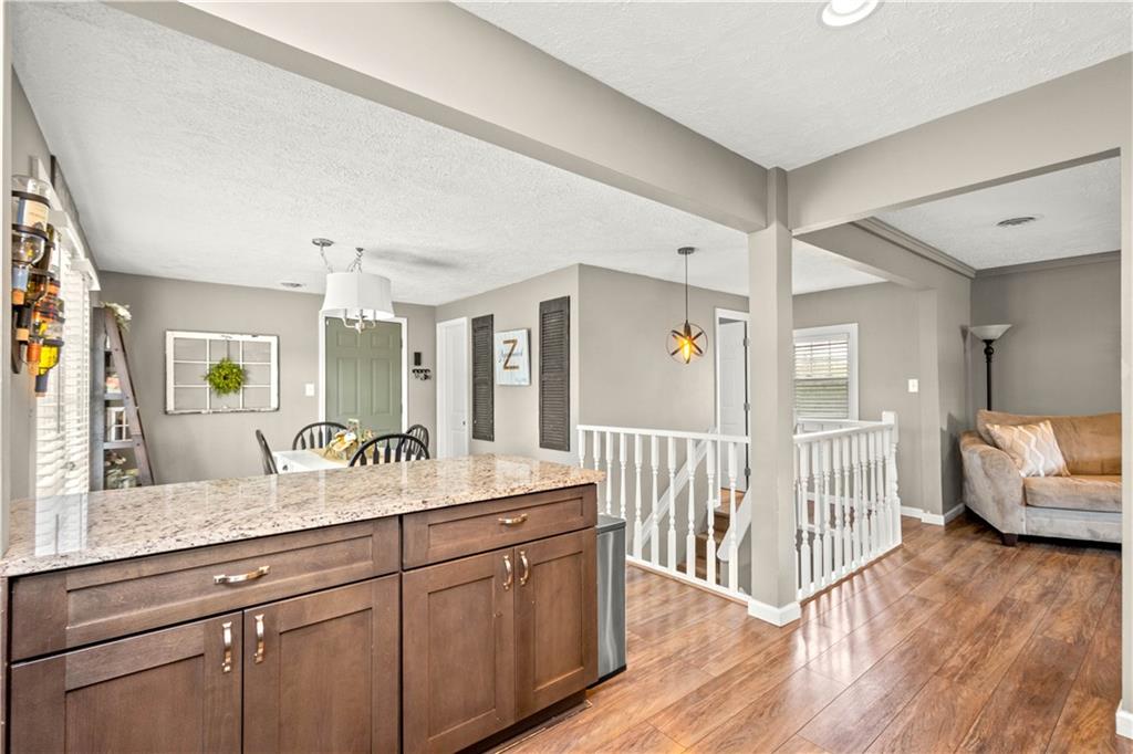 133 Baker Rd Extension Monaca, PA 15061 - Photo 11 of 25 a spacious en suite bathroom with a granite countertop double vanity sink and a large mirror