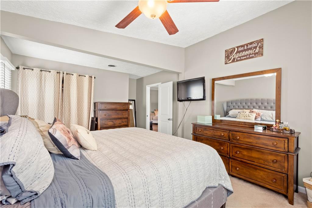 133 Baker Rd Extension Monaca, PA 15061 - Photo 15 of 25 a bedroom with a bed and a dresser