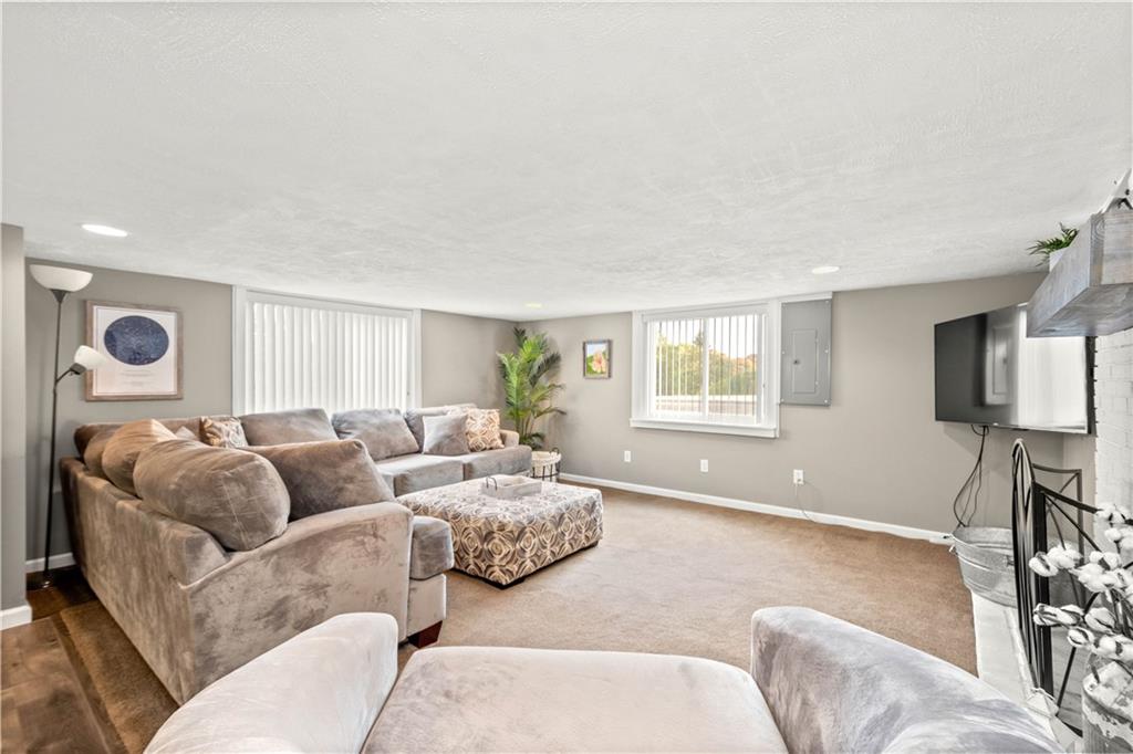 133 Baker Rd Extension Monaca, PA 15061 - Photo 22 of 25 a living room with furniture and a window